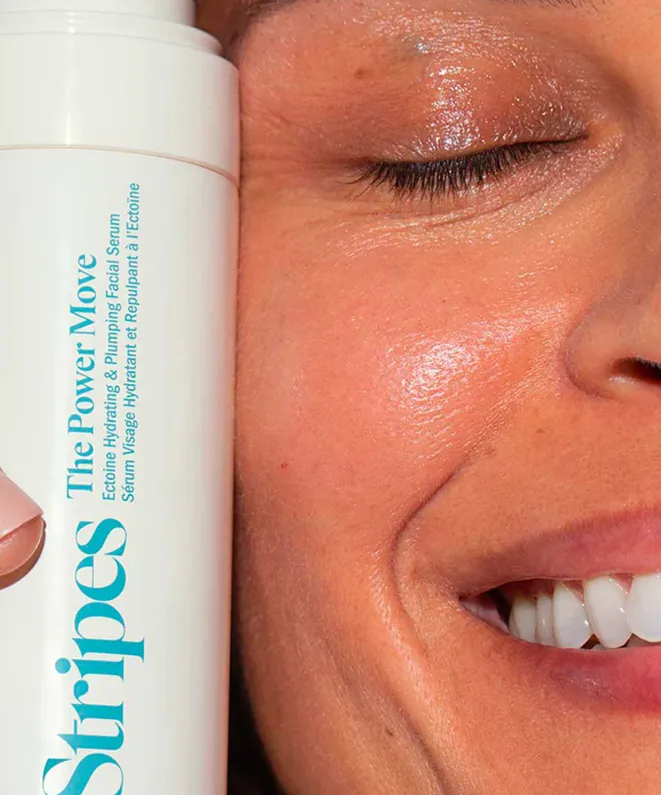A photo of Stripes product with a smiling woman